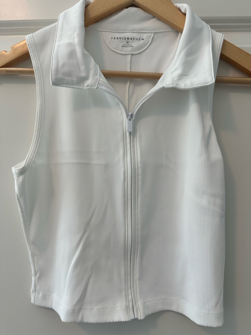 TravisMathew Women's Midline MoveKnit Sleeveless Golf Polo